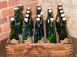 old wooden box with beer bottles