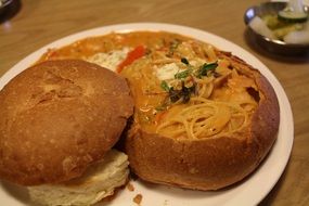 pasta in a plate of bread