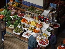 People at a fruit market, Portugal, Madeira