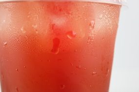 Cold red drink in the glass