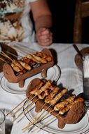 plate for cooking meat kebabs on the grill in the restaurant