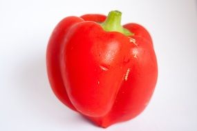 one glossy red bell pepper