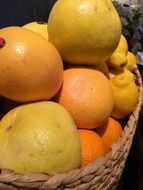 citrus fruits in weaved basket
