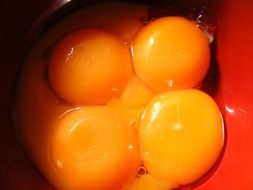 broken eggs in a bowl