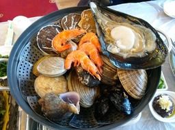 Grilled shellfish on the plate