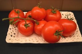 red tomatoes on a tray