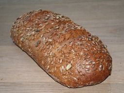 grain bread on a white surface