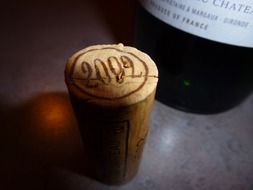 Wooden cork in a wine bottle