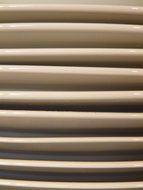 stack of white plates close-up