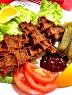 delicious meatballs with vegetables appetizer