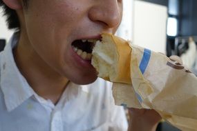 men eating baguette