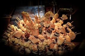 shashlik, pastries and cheese on skewers