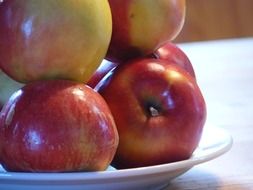 apples on a white plate