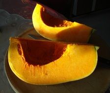 cut pumpkin on a plate