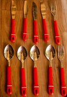 cutlery with red handles