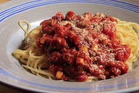 spaghetti bolognese with parmesan cheese