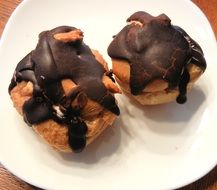 confectionery with chocolate on a white plate