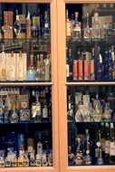 bottles of alcohol in the cupboard