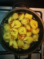 tortellini noodles boil in a sausepan