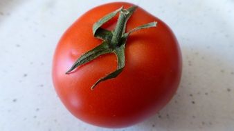 closeup picture of red tomato as food