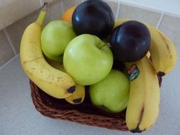 basket of apples and bananas