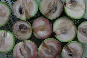 halves of vietnamese fruit on the table