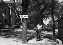 african child boy near water fountain for colored at 1938 year, usa, North Carolina