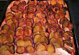 plum cake on pan