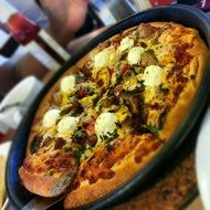 Tasty pizza for dinner in Italy