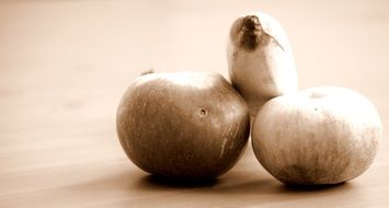 Black and white organic apples and banana