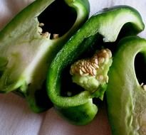 green pepper cut into three parts