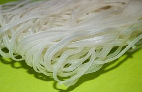 rice noodles on a green plate