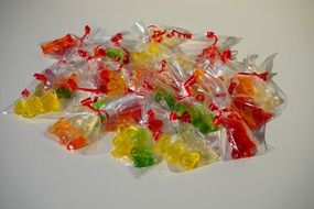 colorful sweet gummi bears packed in sachets