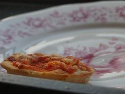 Small pizza on a plate