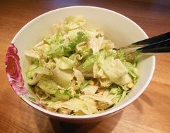 salad in porcelain bowl