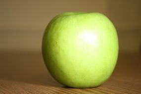 green apple on the table