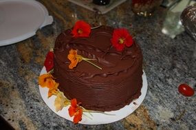 cake with chocolate decorated with flowers