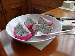 dragon fruit on a white plate