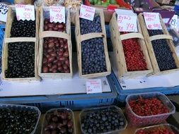 stand of berries in a market