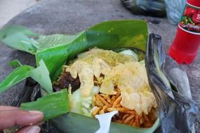 surinamese cuisine, meal in banana leaves