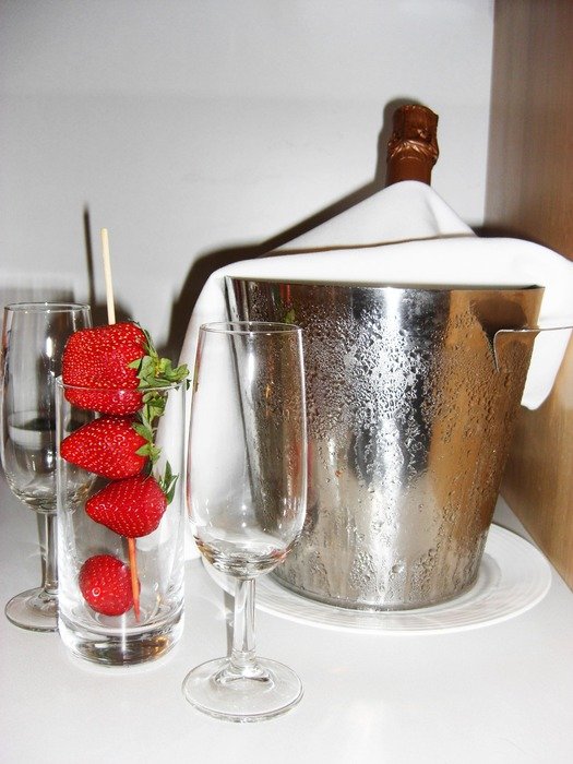 champagne in freezer and strawberries in the hotel