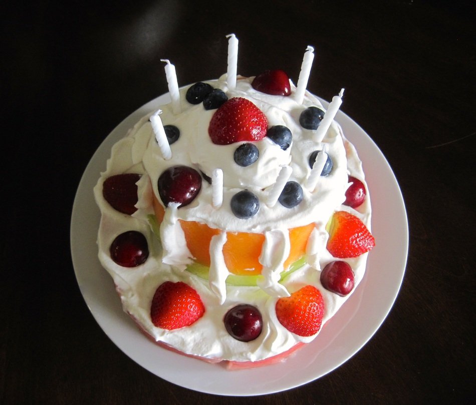 birthday fruit cake with candles