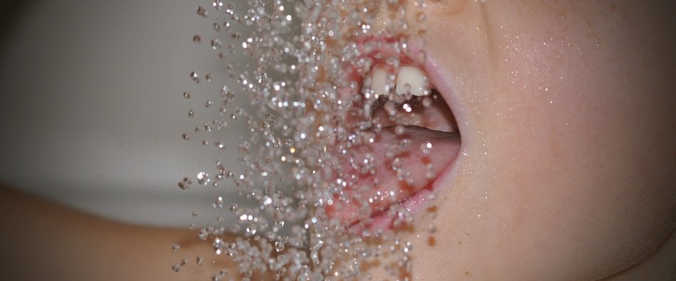 drops of water in front of mouth