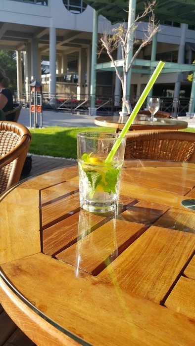 alcohol,Mojito in which the green tube is on the table