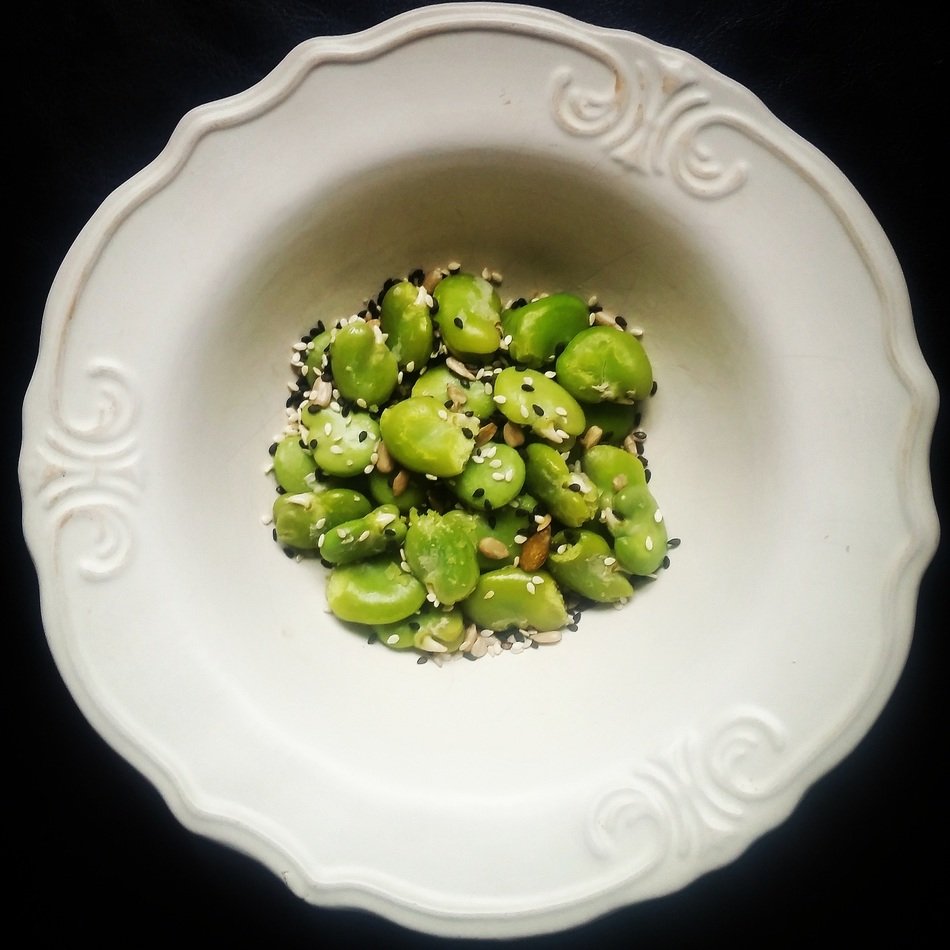 seeds and green beans in a plate