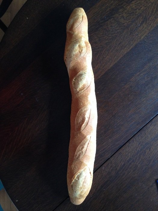 Beautiful baguette on a wooden table