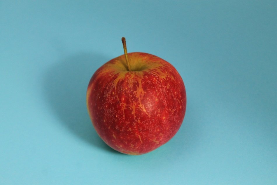 Apple on the blue table