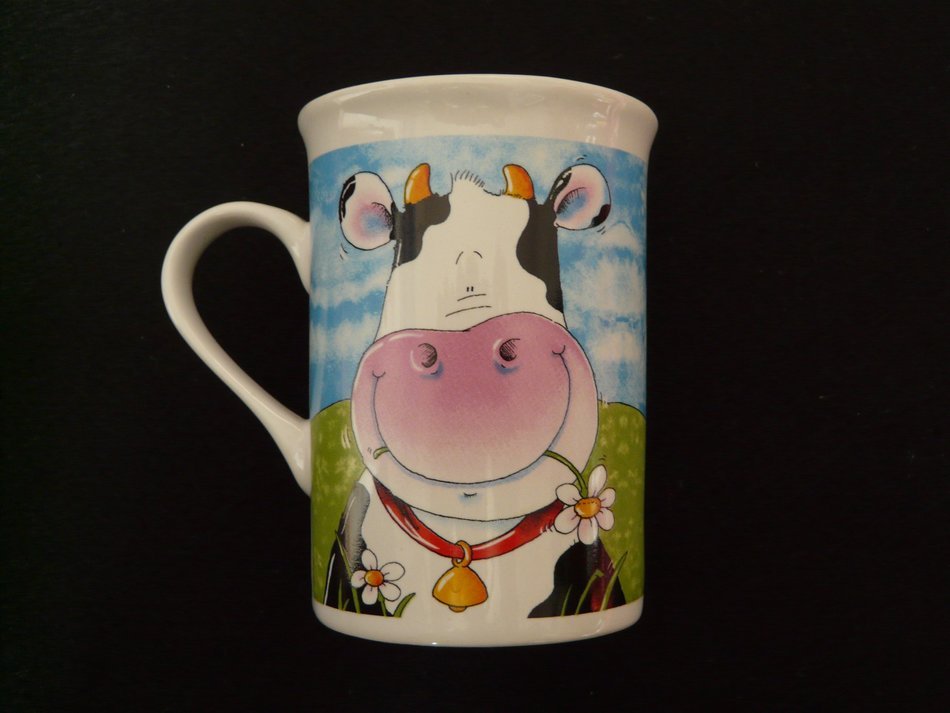 cup coffee with cow