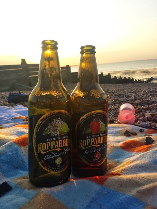 beer bottles on sunset background