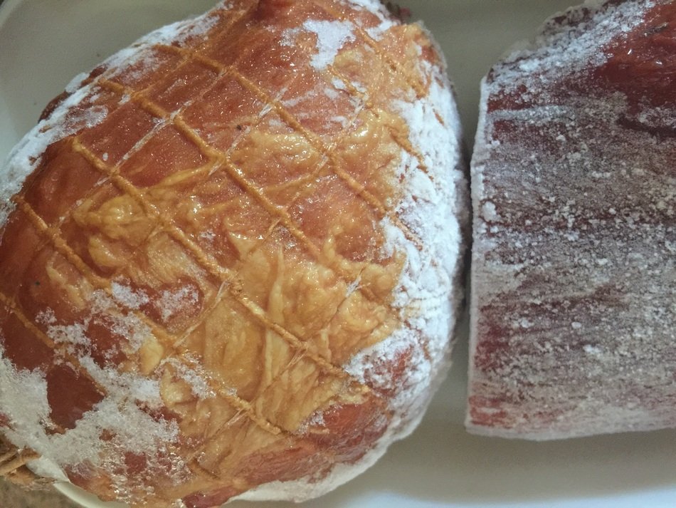 Frozen ham for thawing on the table